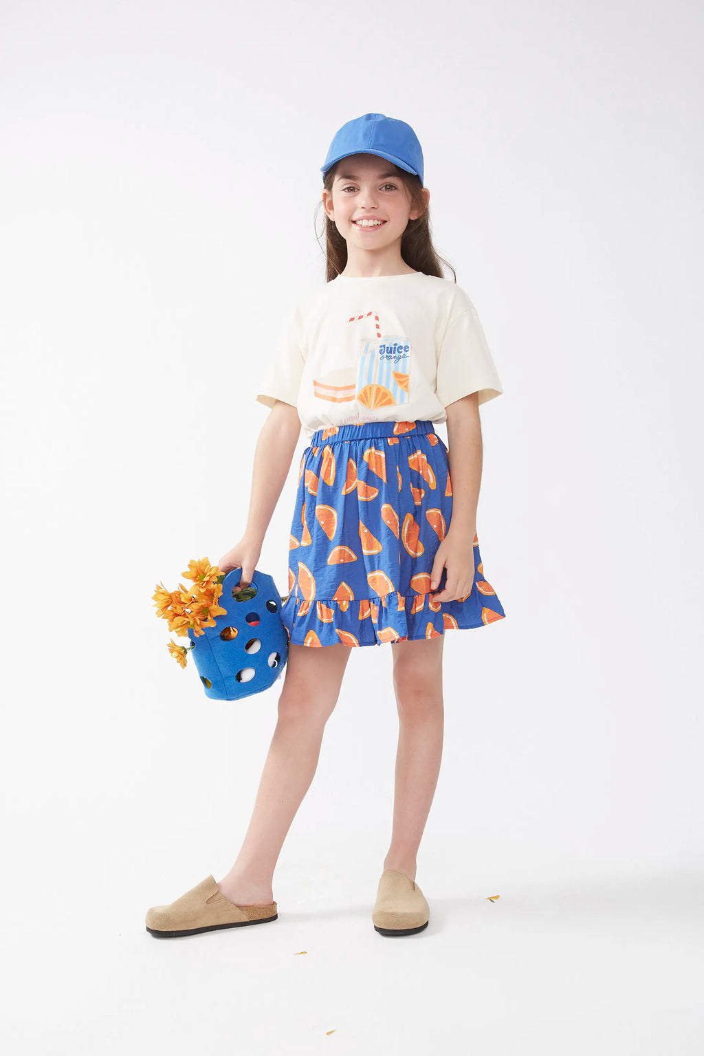 Falda corta de niña estampado pomelos