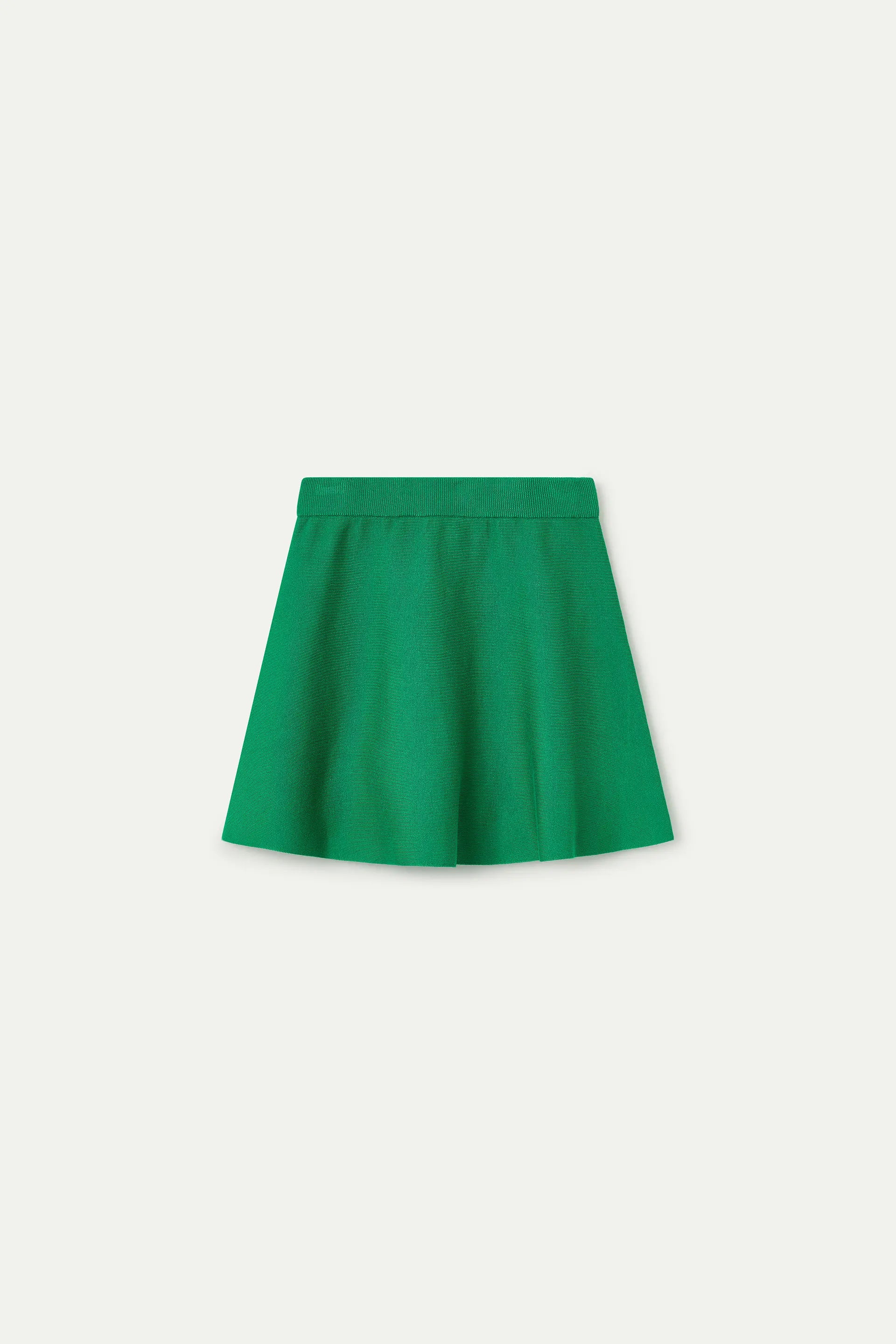 Falda corta punto verde