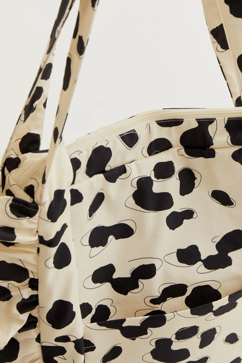 Bolso acolchado con estampado Dalmatian