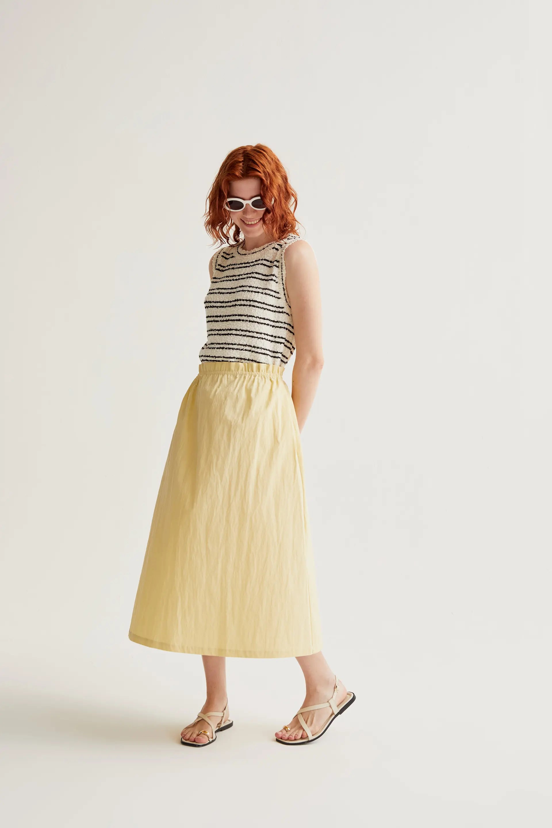 Falda midi amarillo claro