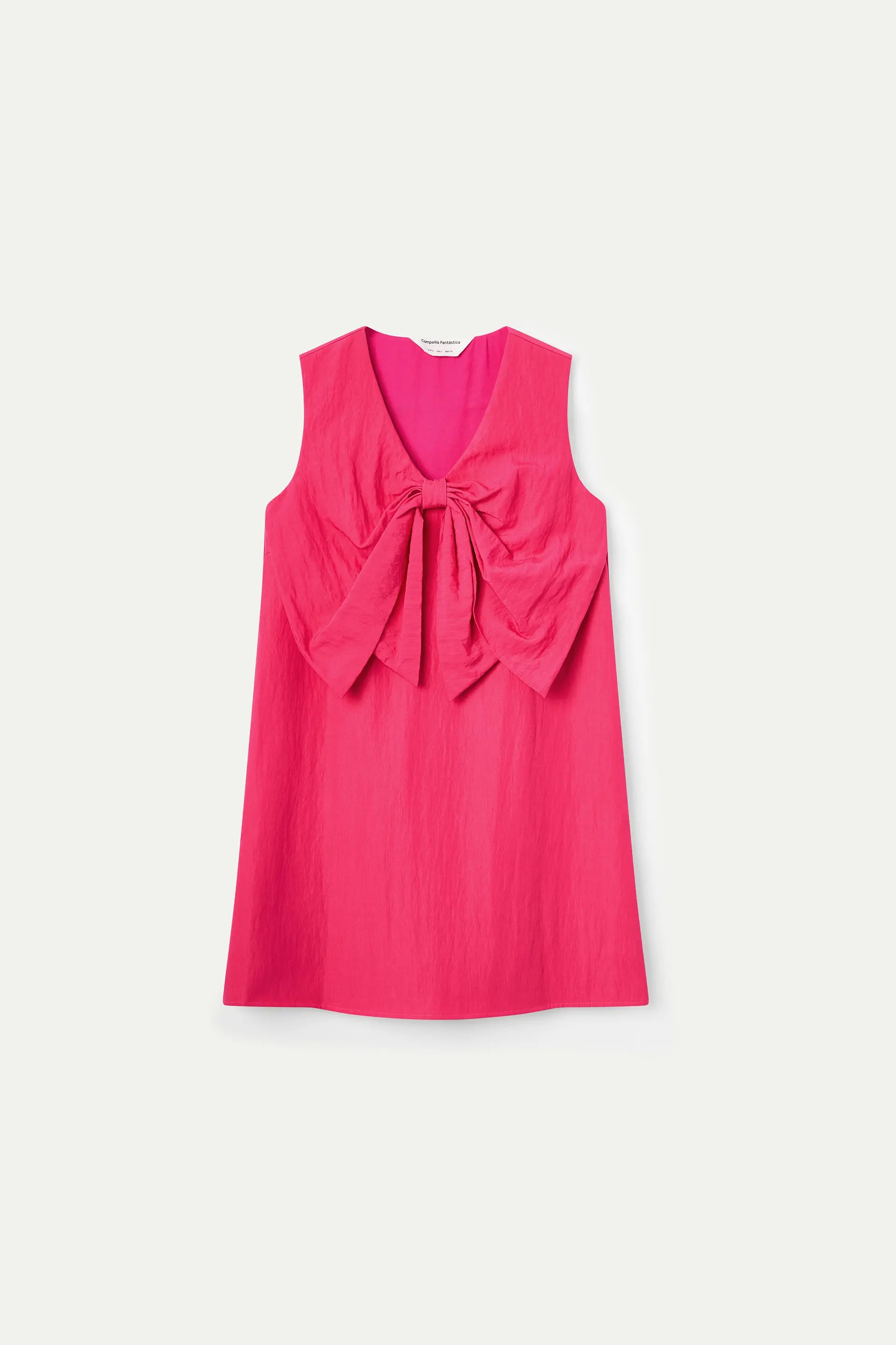 Vestido corto fucsia con maxi lazo