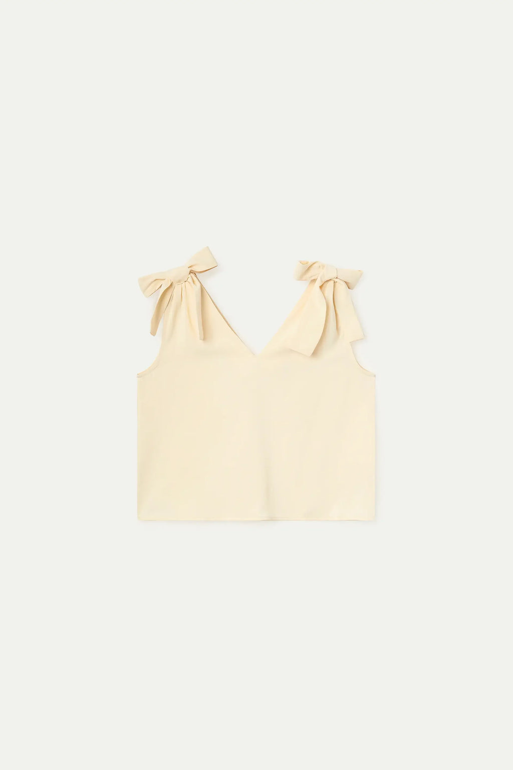 Top blanco roto con tirantes lazados