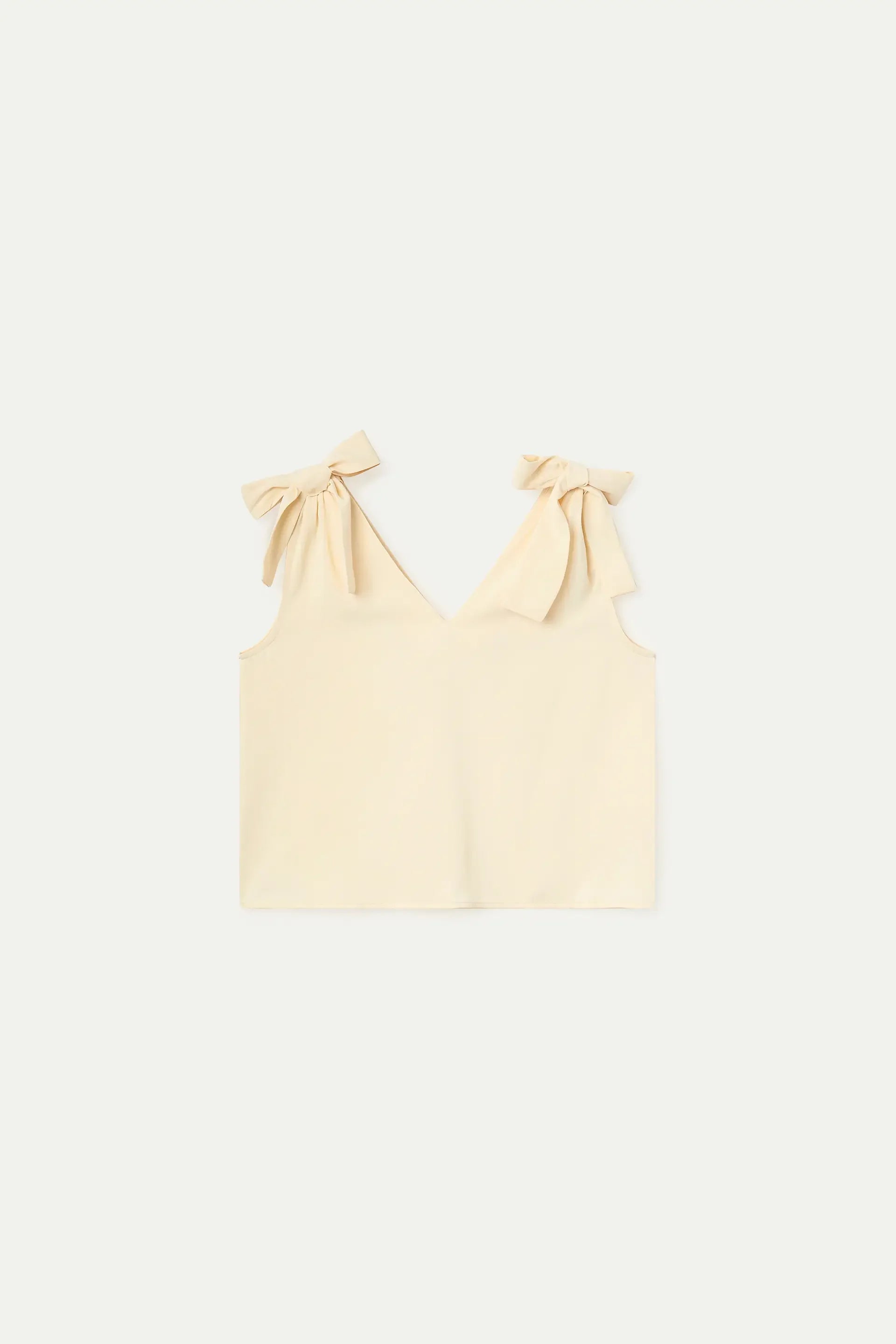 Top blanco roto con tirantes lazados