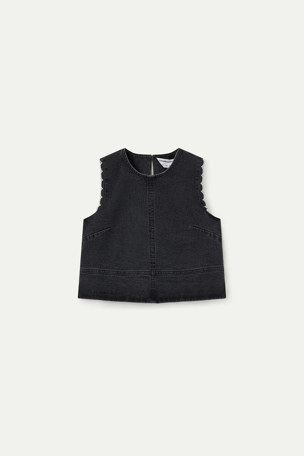 Top vaquero negro con detalles de ondas