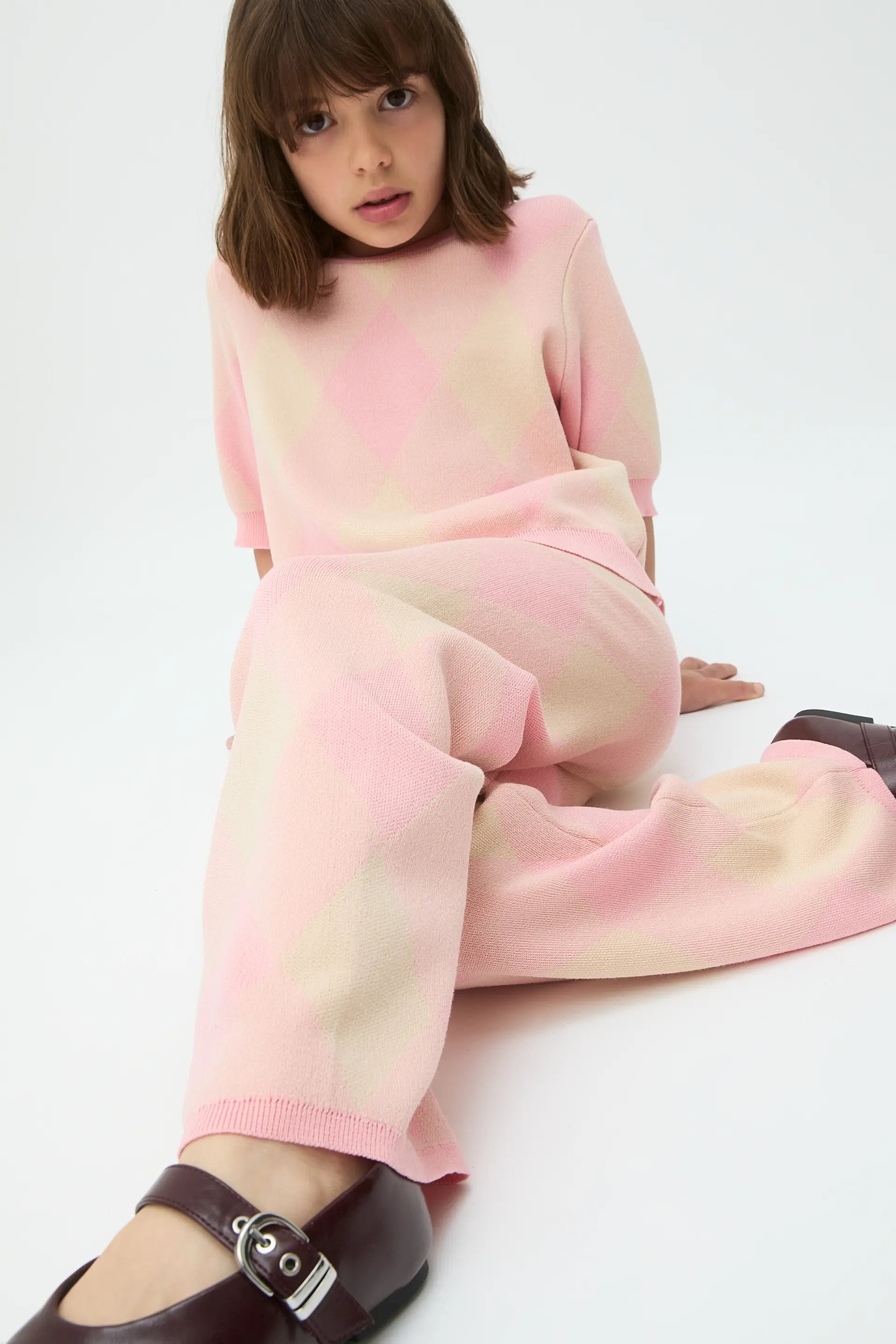 Pantalón punto jacquard de niña con rombos rosas