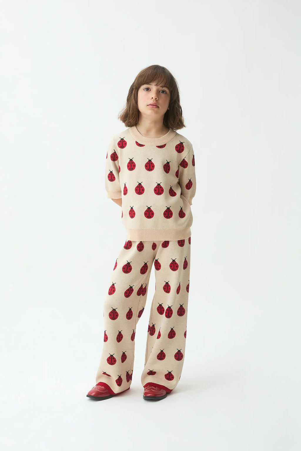 Pantalón punto jacquard de niña con estampado Red Coccinella