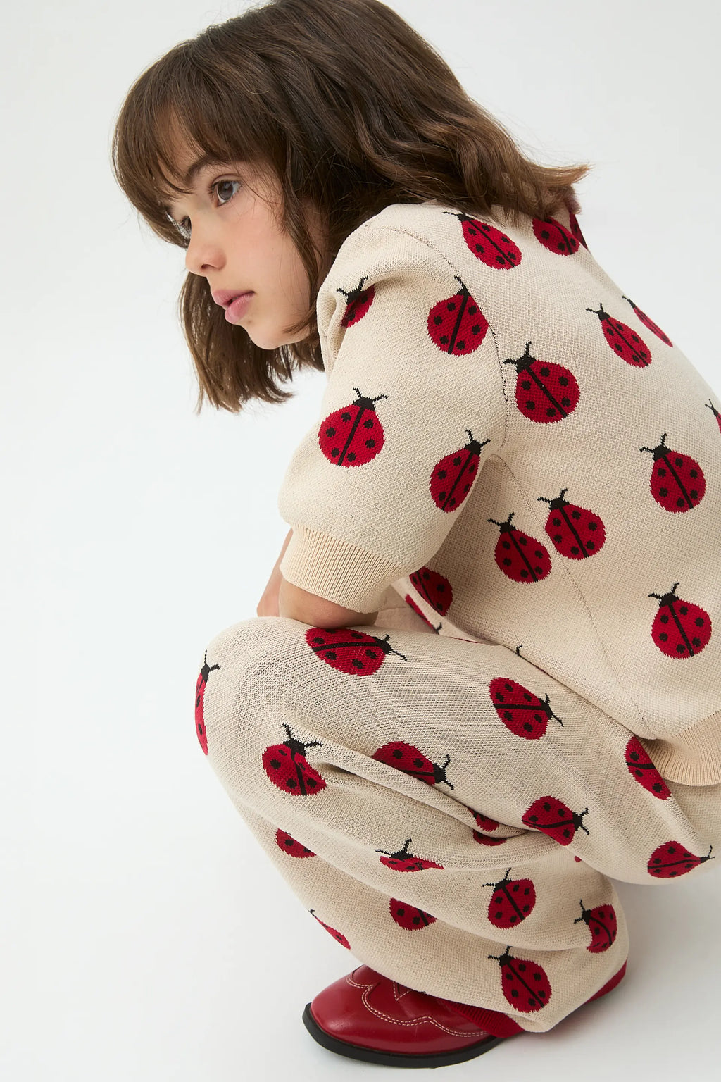 Pantalón punto jacquard de niña con estampado Red Coccinella