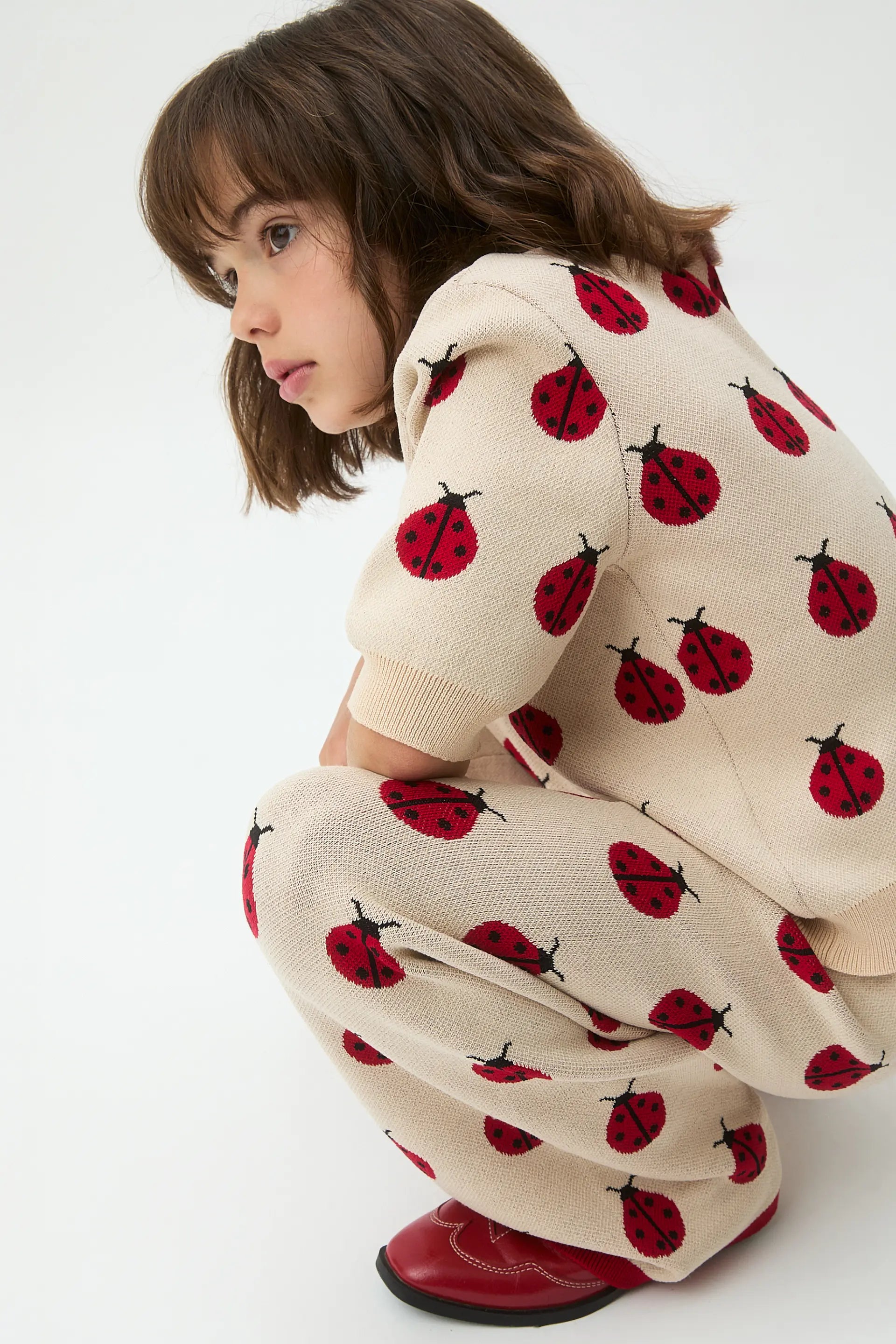 Pantalón punto jacquard de niña con estampado Red Coccinella