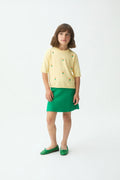 Top de ni?a punto amarillo con detalle floral