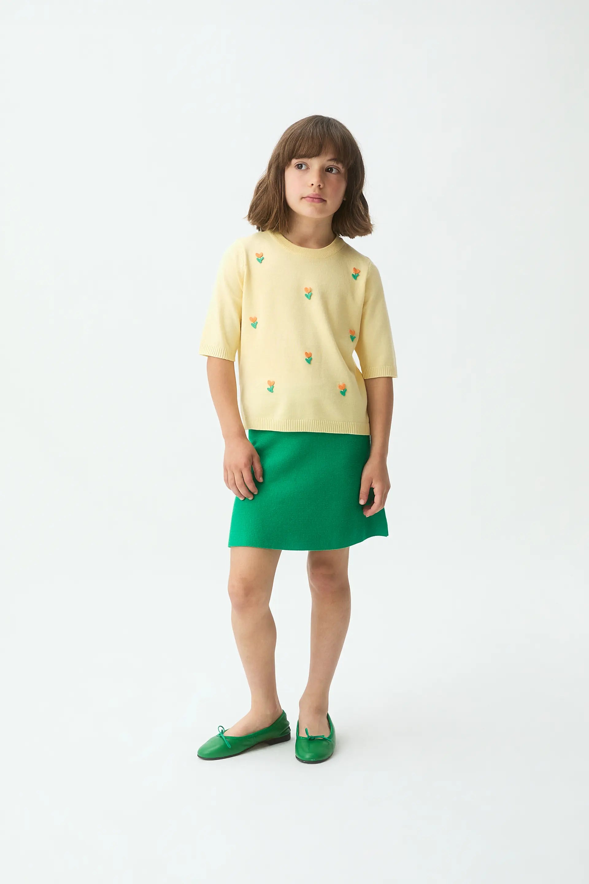 Top de ni?a punto amarillo con detalle floral