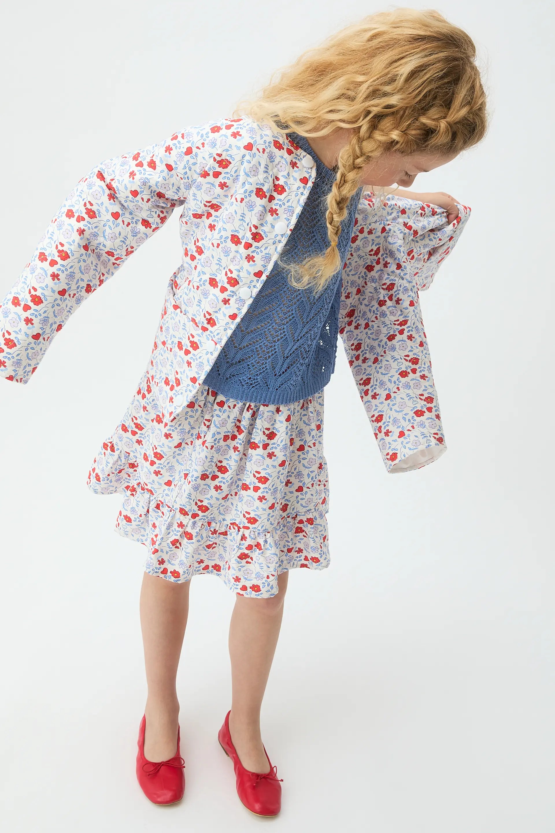 Jersey de niña con bordado azul