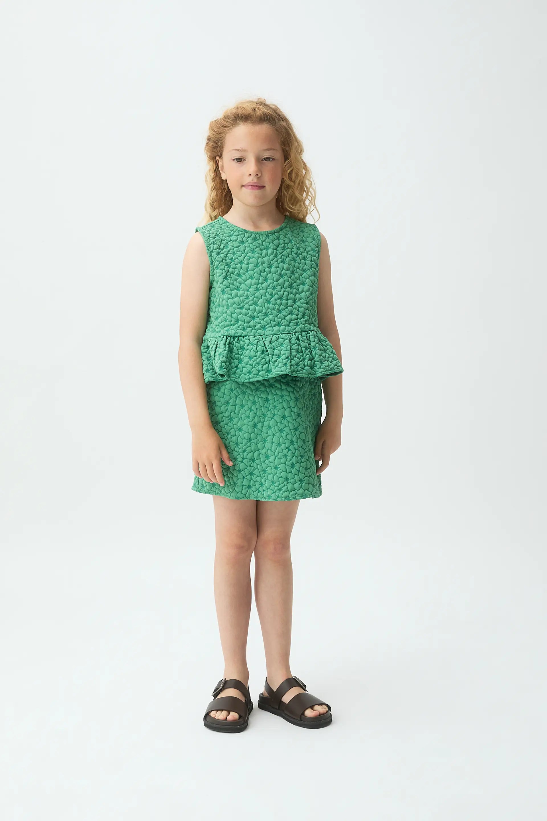 Falda corta de ni?a con estampado floral verde