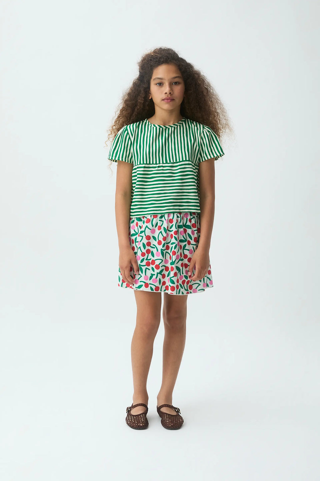 Falda corta de ni?a con estampado Guinda