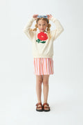 Sudadera de niña blanco roto con parche floral