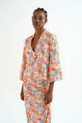 Top playero con estampado Bloom