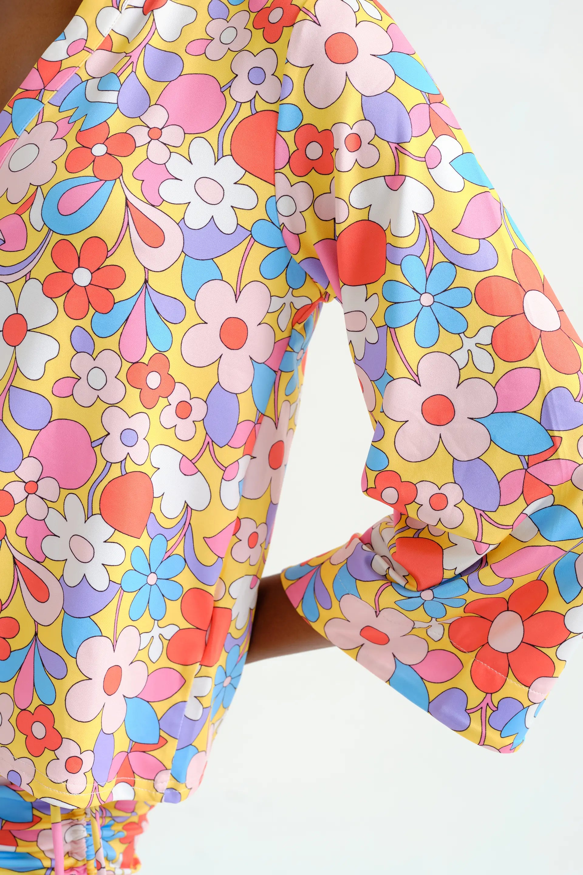 Top playero con estampado Bloom