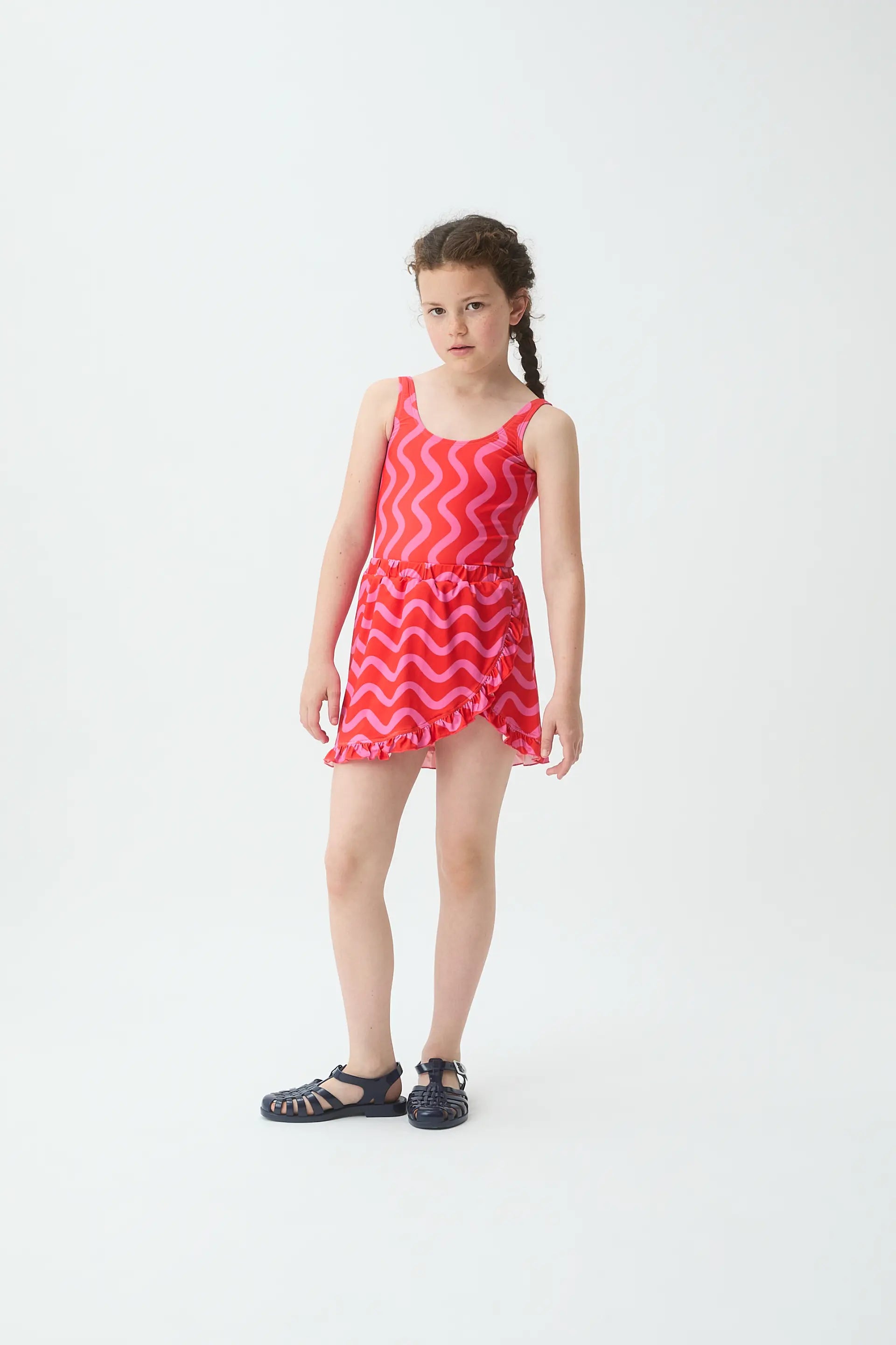 Falda corta pareo de ni?a con estampado Wave Red & Pink